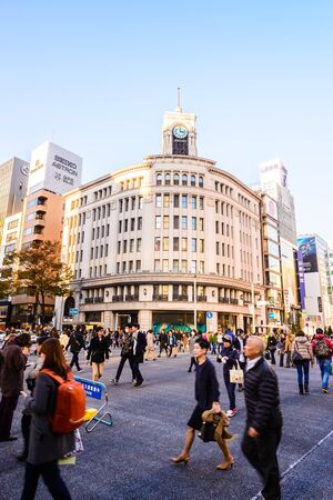 TOKYO - November 28, 2015: The Ginza District November 28, 2015 in Tokyo, Japan. Ginza extends for 2.4 km and is one of the world's best known shopping road districts.のeditorial素材