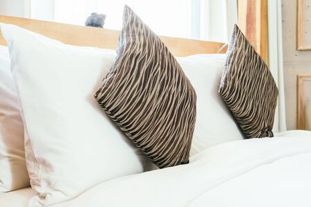 Pillow on beautiful luxury bedroom interior - Vintage filter effectの写真素材