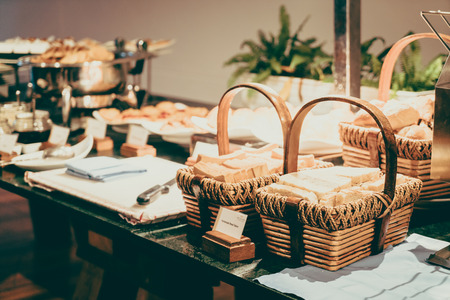 Selective focus point on Catering buffet in hotel restaurant - Vintage filter effect