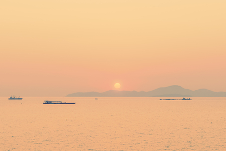 Beautiful Sunset on the sea background - Vintage filterの写真素材
