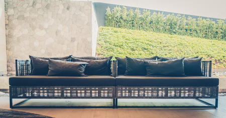 Outdoor deck with modern chair and table - Vintage filter