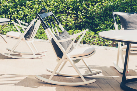 Outdoor deck with modern chair and table - Vintage filterの写真素材