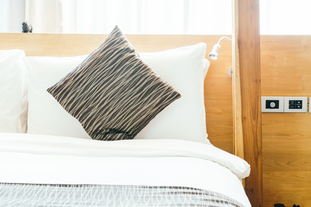 Pillow on beautiful luxury bedroom interior - Vintage filter effectの写真素材