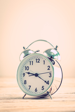 Vintage Classic Alarm clock - Vintage filter processing styleの写真素材