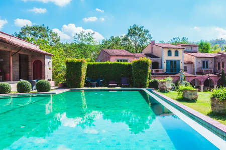 Swimming pool with outdoor view and beautiful Architecture building with tuscany style - Vintage...