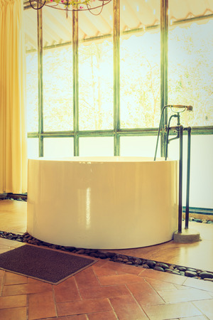 Vintage bathtub decoration in bathroom interior - Vintage Filterのeditorial素材