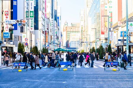 TOKYO - November 28, 2015: The Ginza District November 28, 2015 in Tokyo, Japan. Ginza extends for 2.4 km and is one of the world's best known shopping road districts.のeditorial素材