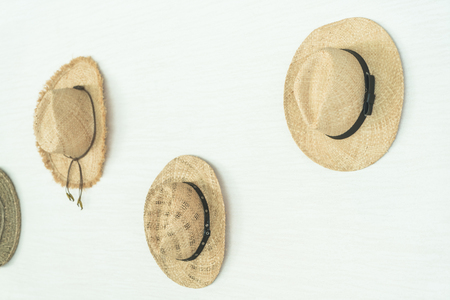 Beach hat decoration on white wall in livingroom interior - Vintage Filterの写真素材