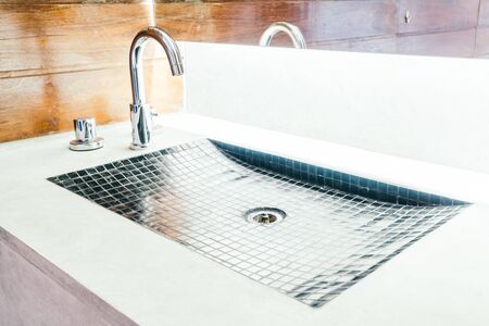 Faucet and sink decortaion in bathroom interior - Vintage filterの写真素材