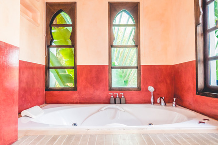 Beautiful luxury Bathtub decoration in bathroom interior - Vintage Filterの写真素材