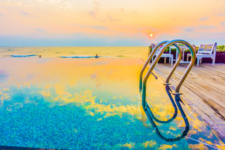 Beautiful luxury Swimming pool hotel resort - Vintage and Boost up color Filterの写真素材