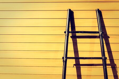 Wooden stair on wood background - Vintage film filterの写真素材