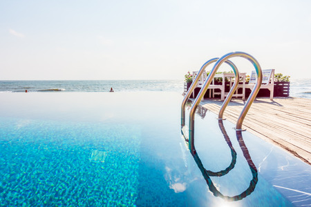 Swimming pool resot hotel with stair pool - Vintage Film Filterの写真素材