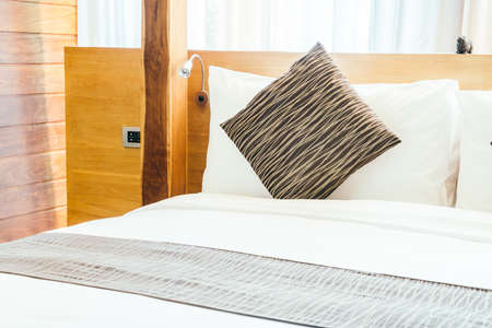 Pillow on beautiful luxury bedroom interior - Vintage filter effect