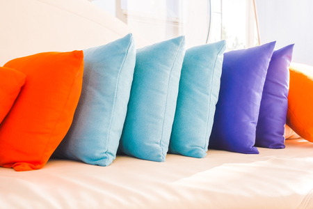 Beautiful luxury pillow on sofa decoration in livingroom interior for background - Vintage Filterの写真素材