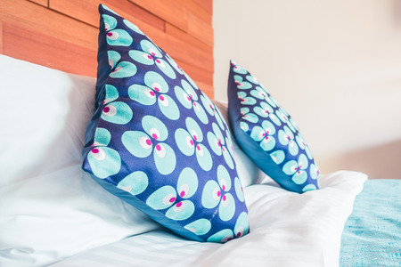 Beautiful luxury Pillow on bed decoration of bedroom interior - Vintage Film filter