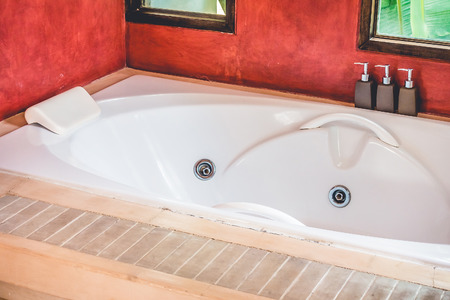 Beautiful luxury Bathtub decoration in bathroom interior - Vintage Filter