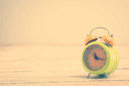 Vintage Classic Alarm clock - Vintage filter processing styleの写真素材
