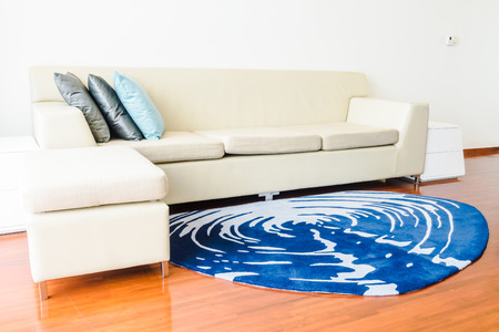 Beautiful luxury pillow on sofa decoration in living room interior - Vintage Light Filterの写真素材
