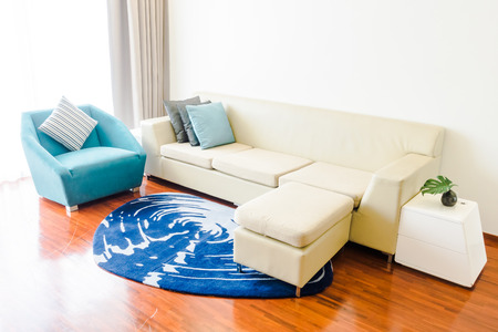 Beautiful luxury pillow on sofa decoration in living room interior - Vintage Light Filterの写真素材