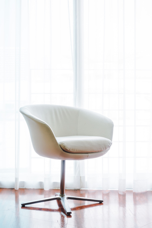 Beautiful luxury pillow on sofa decoration in living room interior - Vintage Light Filterの写真素材