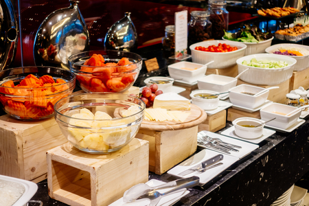 Selective focus point on Breakfast buffet catering in hotel restaurant - Vintage Light Filterの写真素材