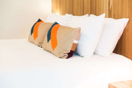 Beautiful luxury pillow on bed decoration in bedroom interior - Vintage Light Filter