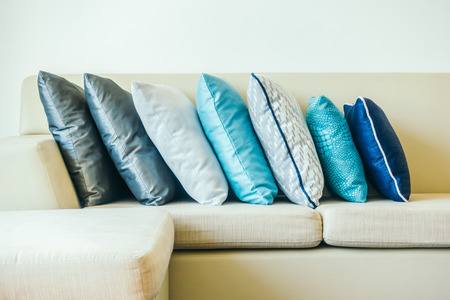 Beautiful luxury pillow on sofa decoration in livingroom interior for background - Vintage Filterの写真素材