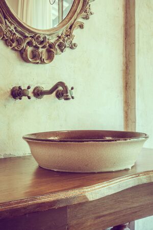 Vintage bathroom decoration with faucet and mirror - Vintage Filterの写真素材