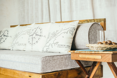 Pillow on sofa decoration in livingroom interior - Vintage Light Filterの写真素材