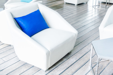 Beautiful luxury pillow on sofa decoration in living room interior - Vintage Light Filterの写真素材