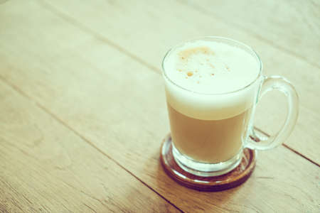 Coffee cup in coffee shop cafe - vintage filterの写真素材