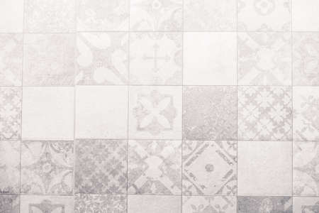 Gray and white tiles wall textures for background - Vintage Light Filterの写真素材