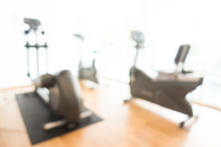 Fitness equipment and gym room interior for background