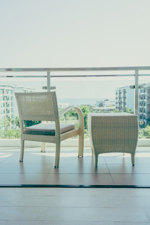 Outdoor patio deck with table and chair furnitures decoration - Vintage filterの写真素材