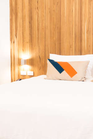 Beautiful luxury pillow on bed decoration in bedroom interior - Vintage Light Filterの写真素材