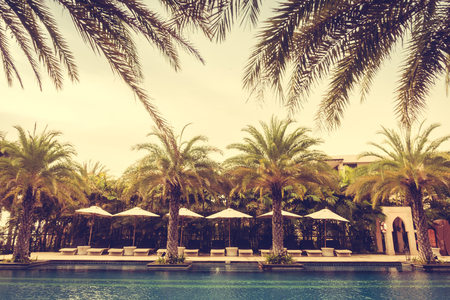 Beautiful luxury vintage swimming pool in hotel pool resort - Vintage Filterのeditorial素材