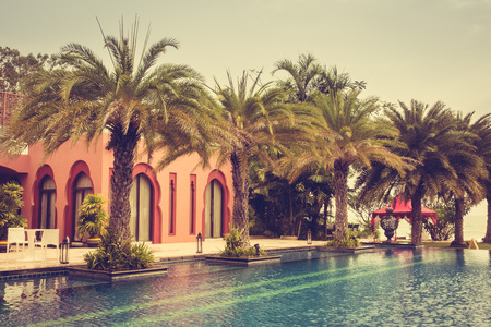 Beautiful luxury vintage swimming pool in hotel pool resort - Vintage Filterのeditorial素材
