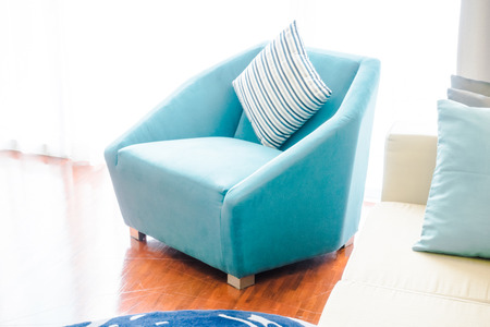 Beautiful luxury pillow on sofa decoration in living room interior - Vintage Light Filterの写真素材