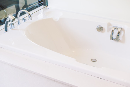 Beautiful luxury Bathtub decoration in bathroom interior - Vintage light Filterの写真素材