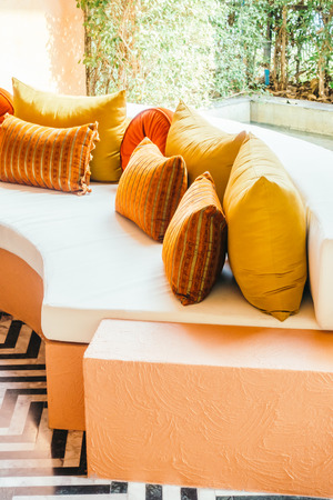 Beautiful luxury pillow on sofa decoration in living room interior - Vintage Light Filterの写真素材