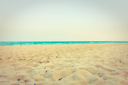Beautiful empty sand for copy space on the beach and sea landscape - Vintage Filter and Boost up Color Processingの写真素材