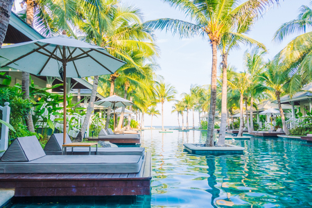 Beautiful luxury swimming pool in hotel pool resort - Boost up color Processingの写真素材