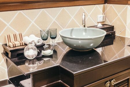 Beautiful luxury sink decoration in bathroom interior - Vintage Light Filterの写真素材