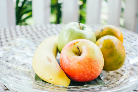 Selective focus point on fruit in plate - Vintage Light Filterの写真素材