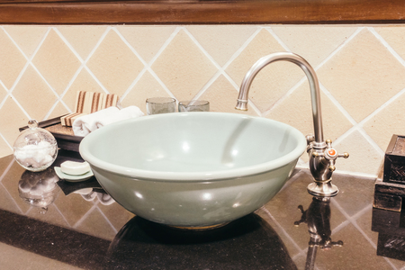 Beautiful luxury sink decoration in bathroom interior - Vintage Light Filterの写真素材