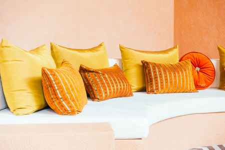 Beautiful luxury pillow on sofa decoration in living room interior - Vintage Light Filterの写真素材