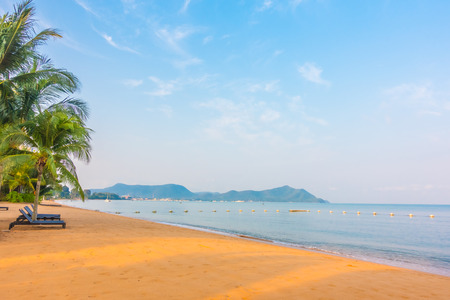 Beautiful beach and sea with empty chair on tropical beach - Filter effect and boost up color Processingの写真素材