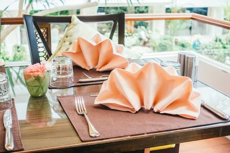 Beautiful luxury Table setting for dinner in restaurant interior - Vintage Light filter
