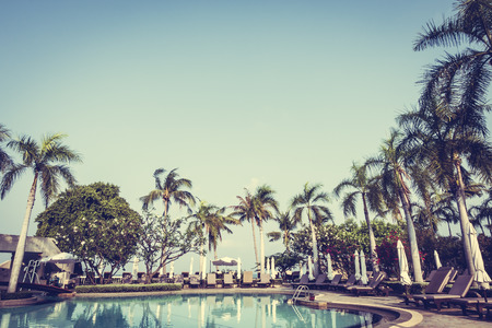 Beautiful luxury outdoor swimming pool in hotel resort - Vintage Filter
